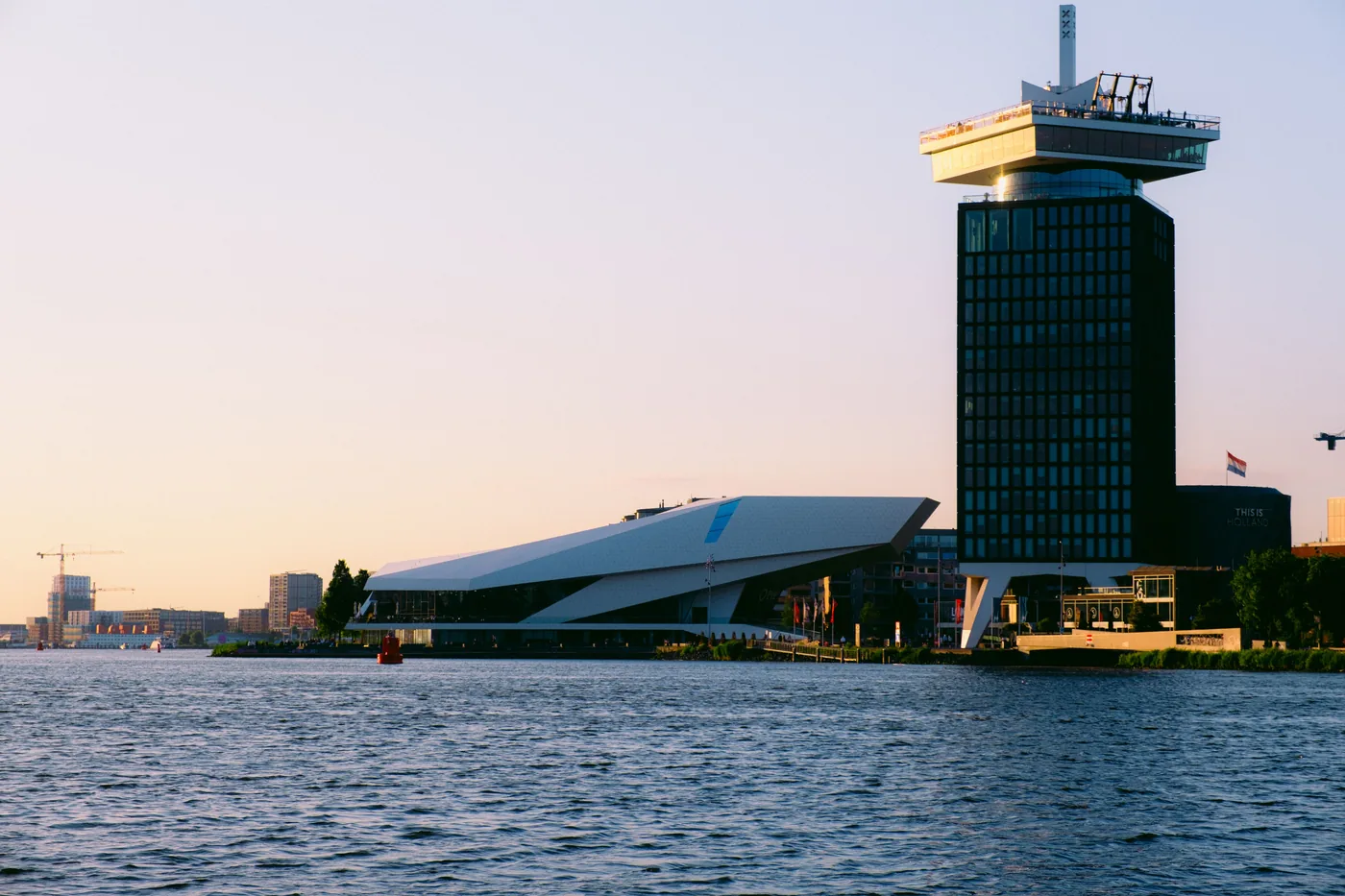 The A'DAM tower on the north bank of the IJ seen across the water in Amsterdam