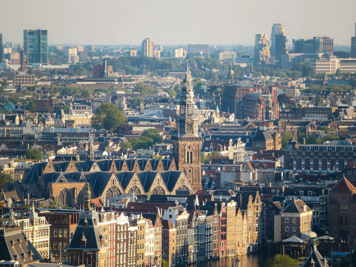 A high view over the rooftops and church towers of central Amsterdam