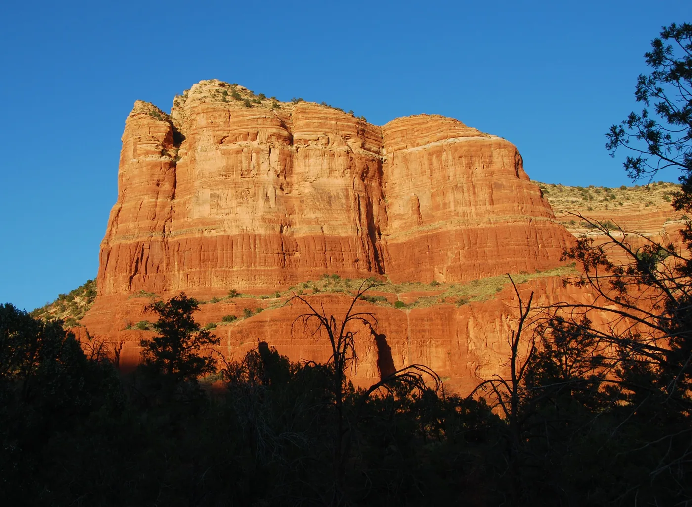Red rock formations under a blue sky in Sedona, Arizona