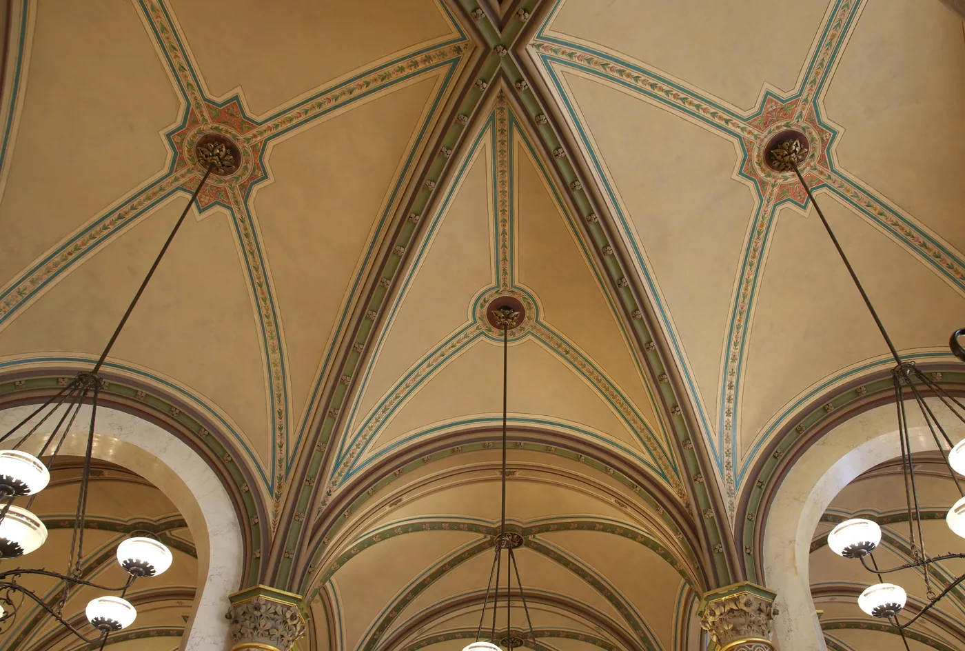 The vaulted arches and marble columns inside Café Central in Vienna