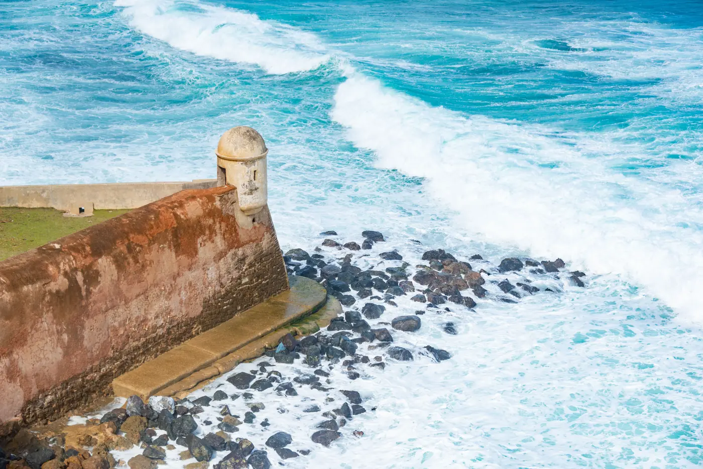 The Garita del Diablo sentry box above the waves at Castillo San Cristóbal
