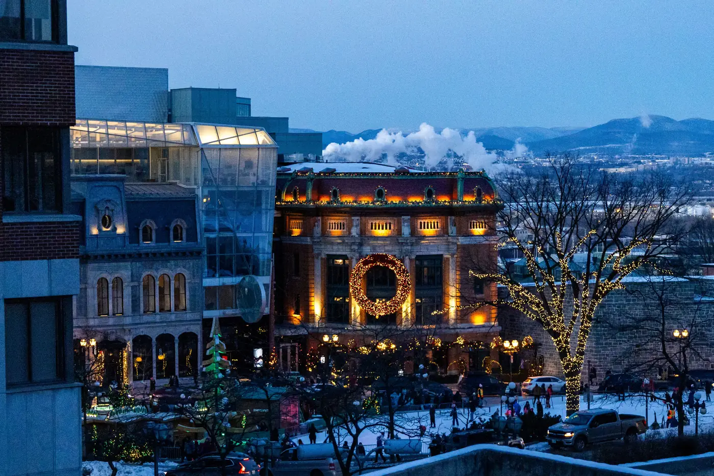 Old Quebec City lit up for the holidays on a snowy winter evening