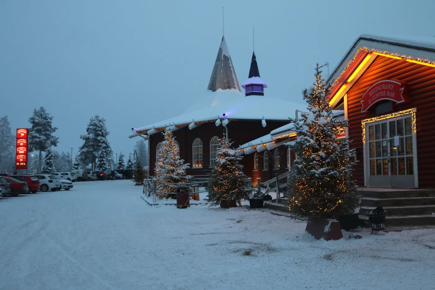 Santa Claus Village in Rovaniemi covered in snow at twilight