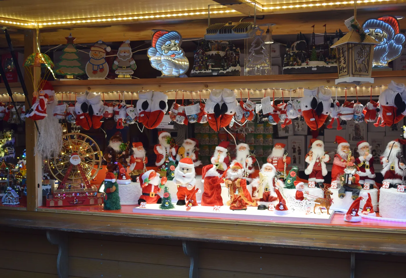 A Christmas market stall full of Santa figures and ornaments in Strasbourg