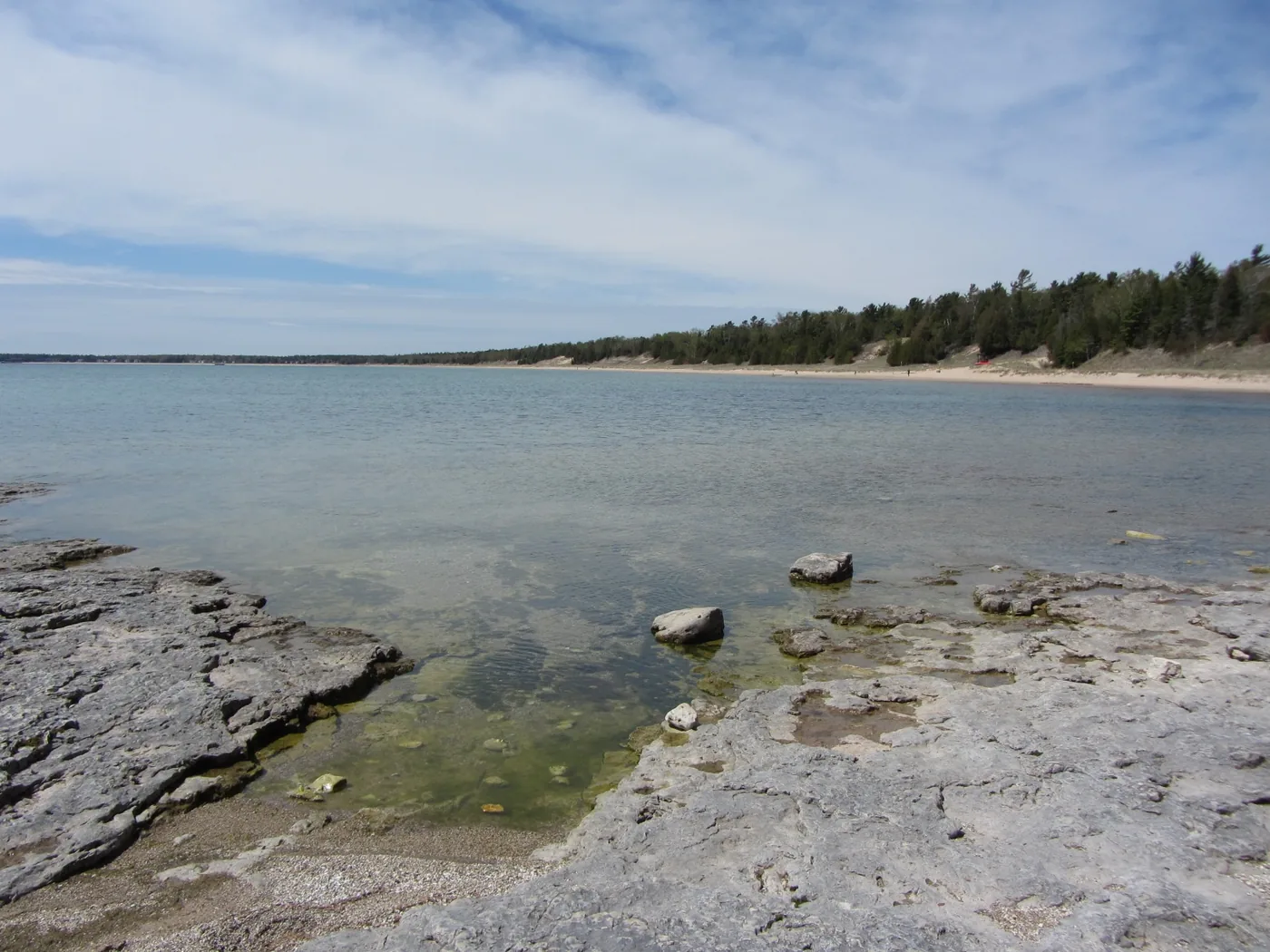 Clear shallow water over limestone ledges at Whitefish Dunes in Door County