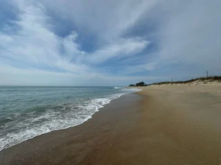 Empty sand and dunes along the shoreline at Hatteras on the Outer Banks