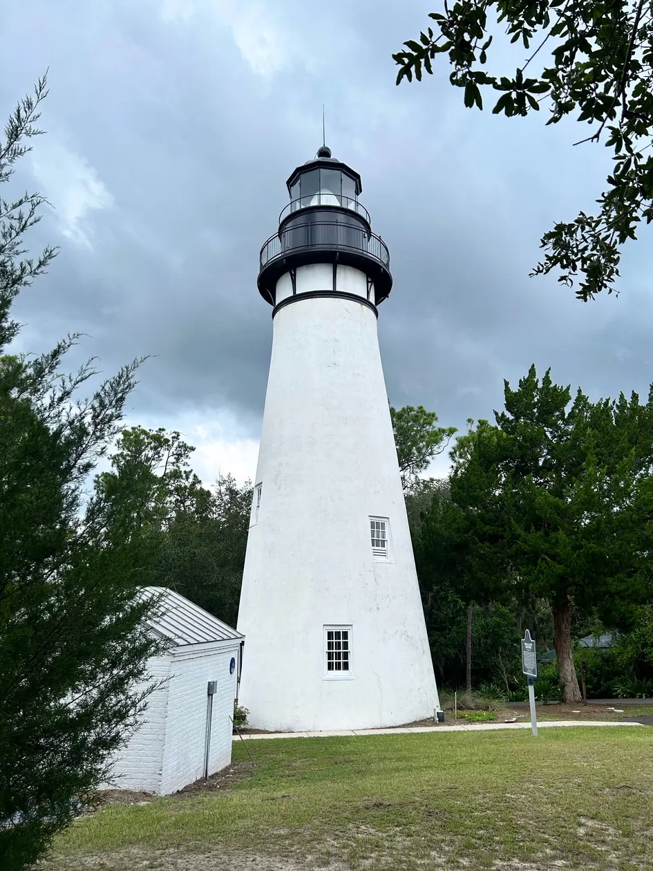 The white Amelia Island Lighthouse in Fernandina Beach, Florida