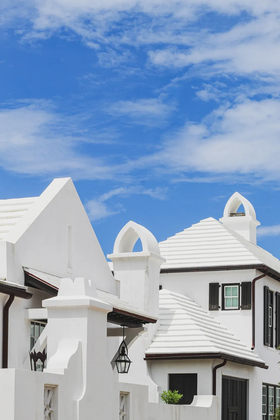 White buildings with steep roofs in Rosemary Beach, Florida