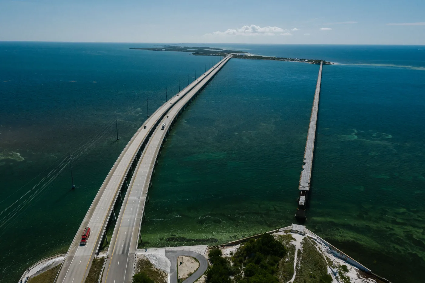An aerial view of the Seven Mile Bridge beside the old railroad bridge in the Florida Keys