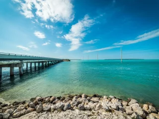 A bridge running across turquoise water in the Florida Keys