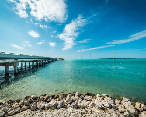 A bridge running across turquoise water in the Florida Keys