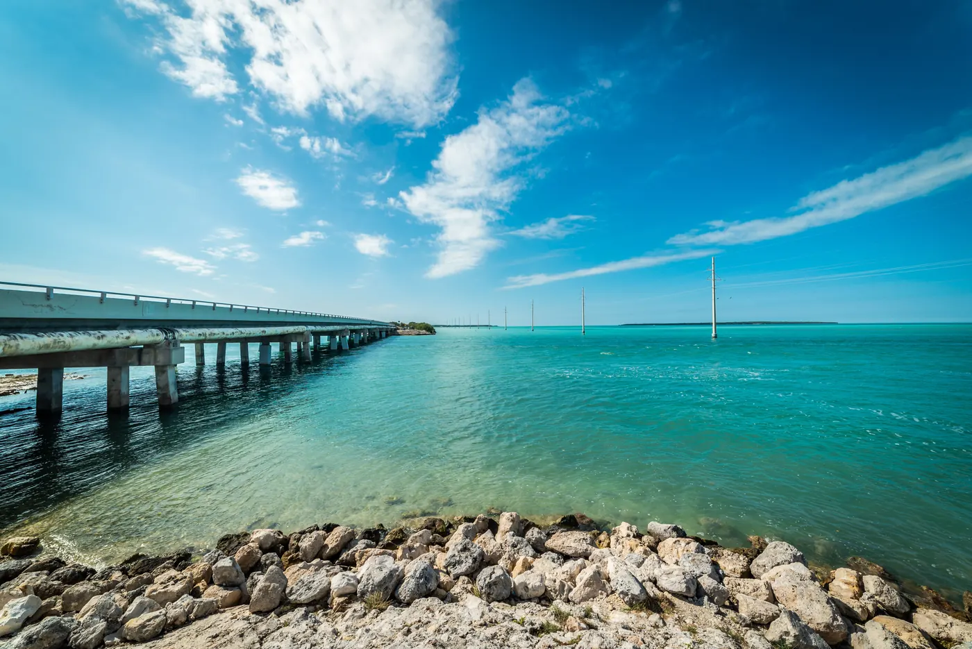 A bridge running across turquoise water in the Florida Keys