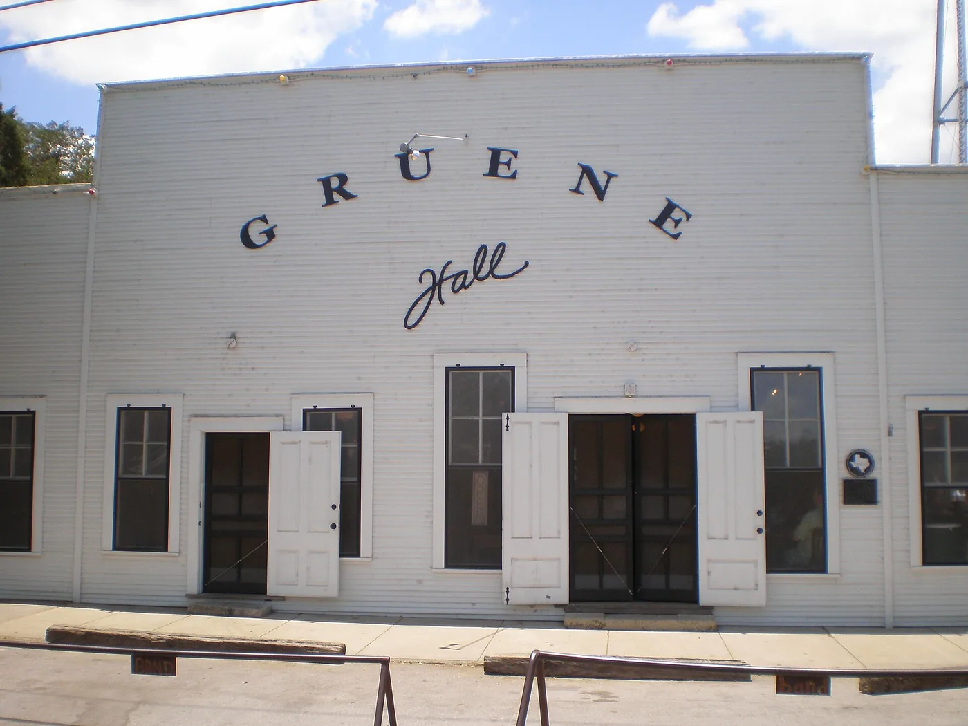 The white wooden front of Gruene Hall in Gruene Texas