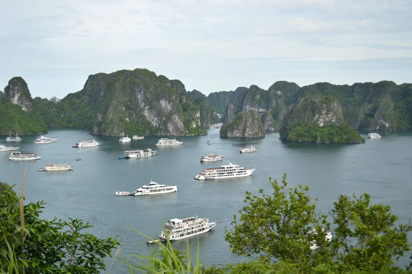 Cruise boats among the limestone islands of Ha Long Bay