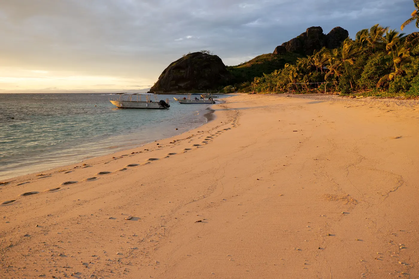 Golden sunset over a quiet beach in the Yasawa Islands, Fiji