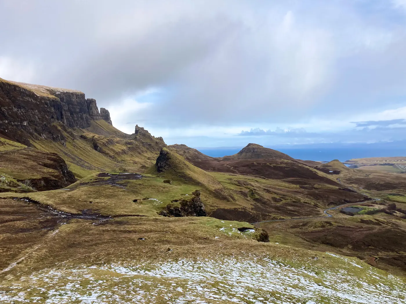 The Quiraing landslip ridge under moving cloud on the Isle of Skye
