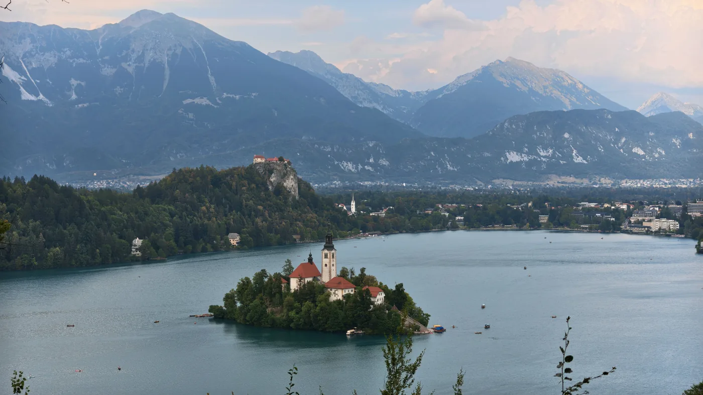 The island church on Lake Bled with the Julian Alps behind it