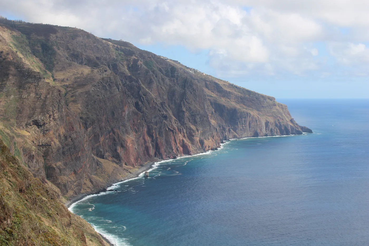 Dramatic coastal cliffs dropping into the Atlantic on Madeira, Portugal