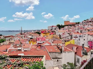 Colorful rooftops of Lisbon Portugal looking out over the Tagus River