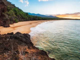 Sunset over Mākena Beach on Maui's south shore