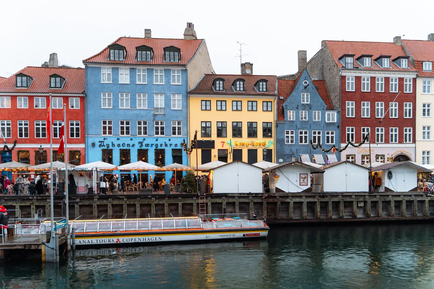 Market stalls lined up along the Nyhavn canal in Copenhagen