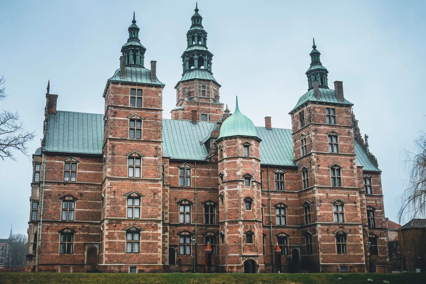 Rosenborg Castle in Copenhagen under a cloudy sky