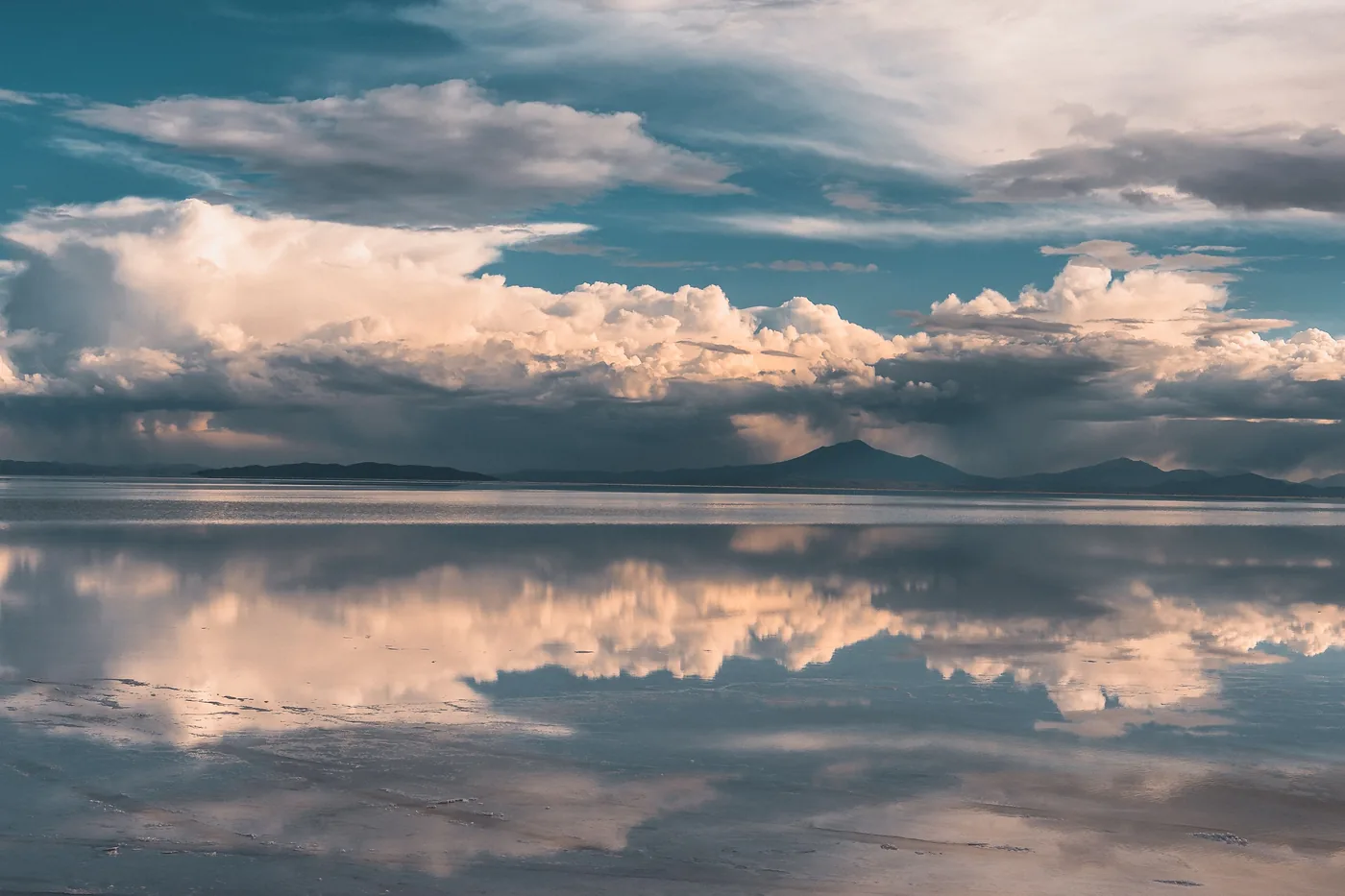 Clouds reflected on the wet surface of Salar de Uyuni in Bolivia