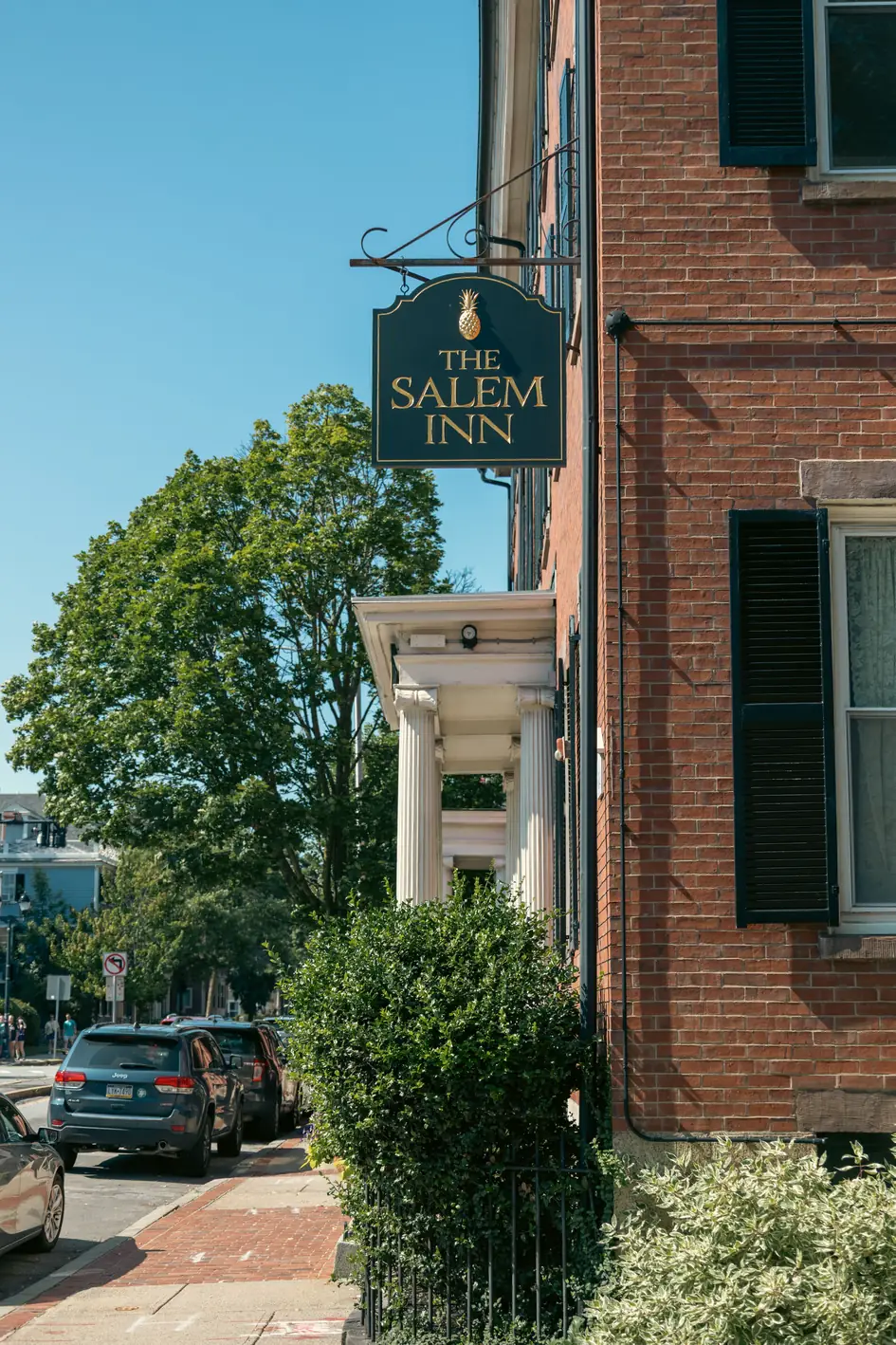 The Salem Inn sign on a brick building in Salem Massachusetts