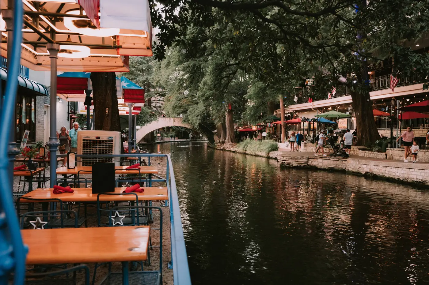 Riverside dining along the San Antonio River Walk in the evening