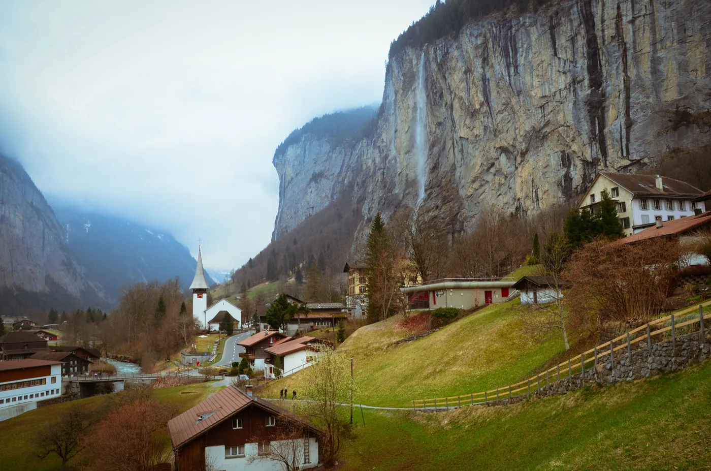 The Lauterbrunnen valley in Switzerland with cliffs rising on both sides