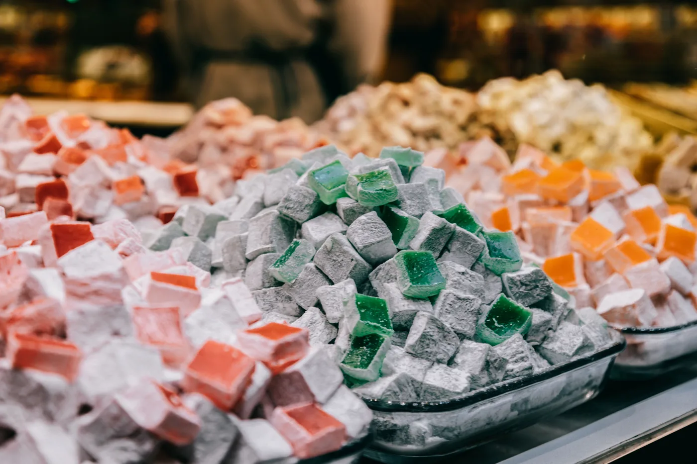 Cubes of soft fruit candy dusted with powdered sugar