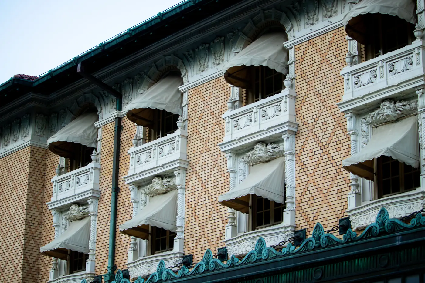 The ornate facade of a historic bathhouse on Bathhouse Row in Hot Springs, Arkansas