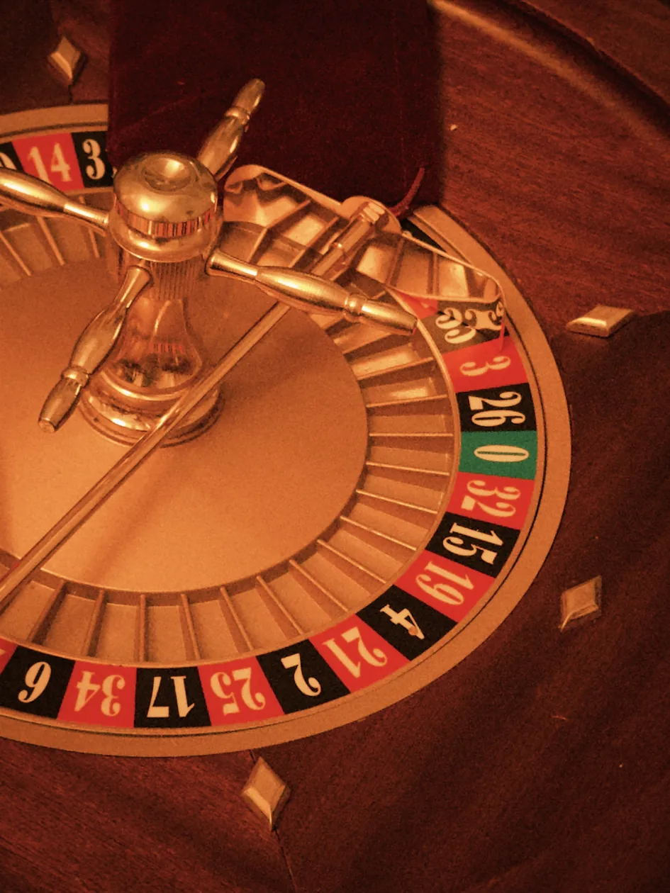 A vintage wooden roulette wheel