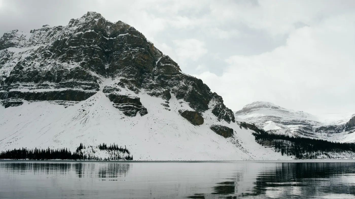 Bow Lake beneath snowy mountains along the Icefields Parkway