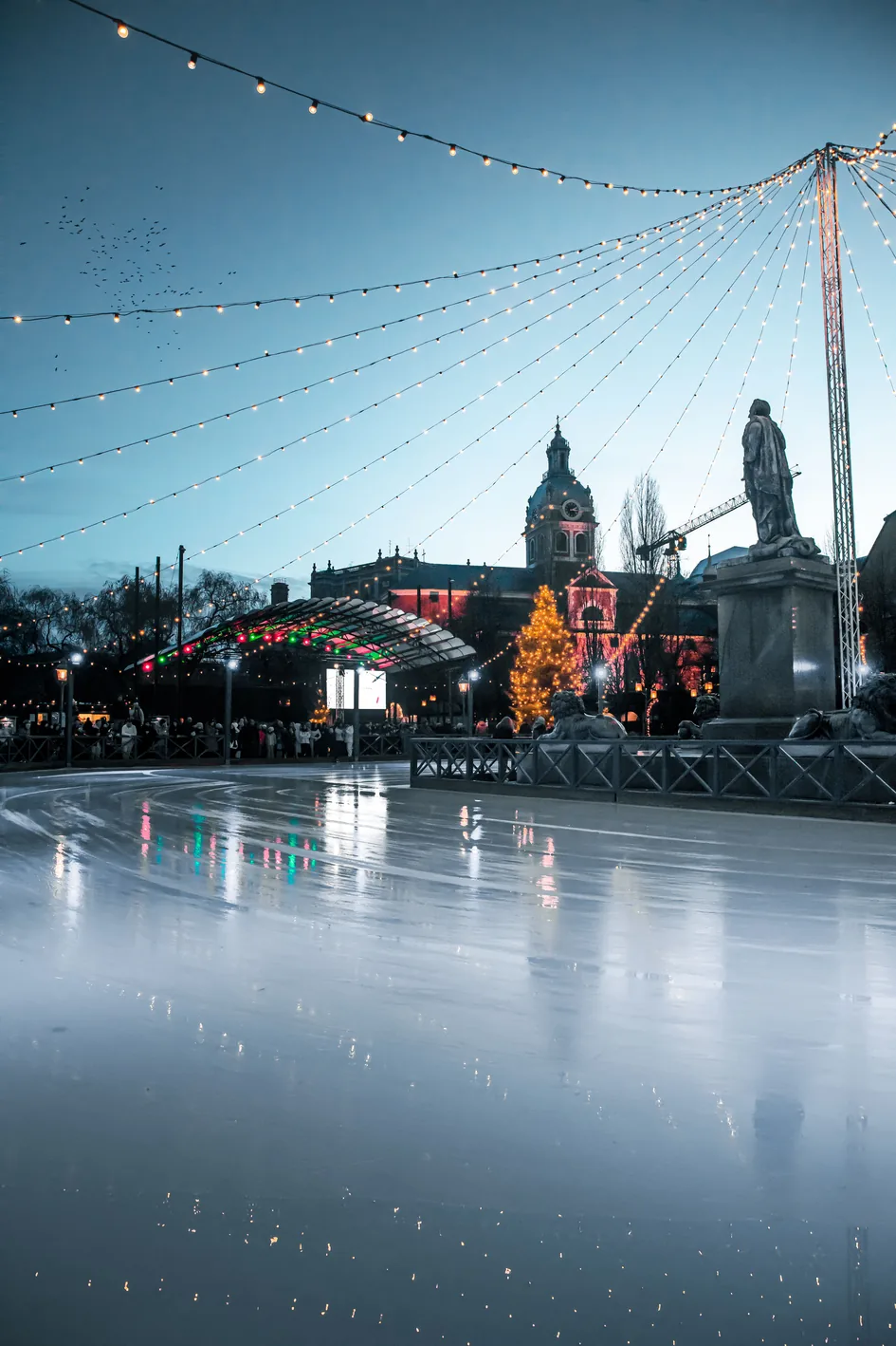 The outdoor ice rink at Kungsträdgården in Stockholm at twilight