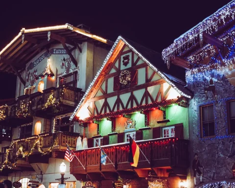 A Bavarian style building covered in Christmas lights at night in Leavenworth, Washington