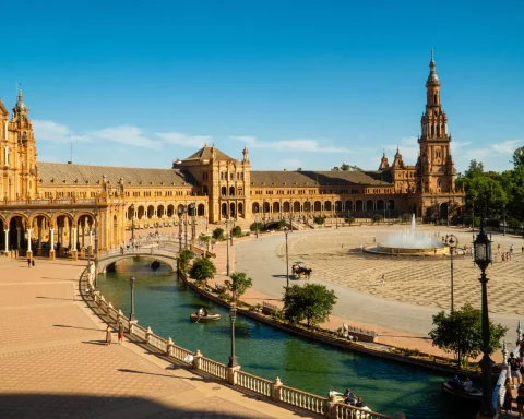 Plaza de España in Seville on a sunny day, with its canal and towers