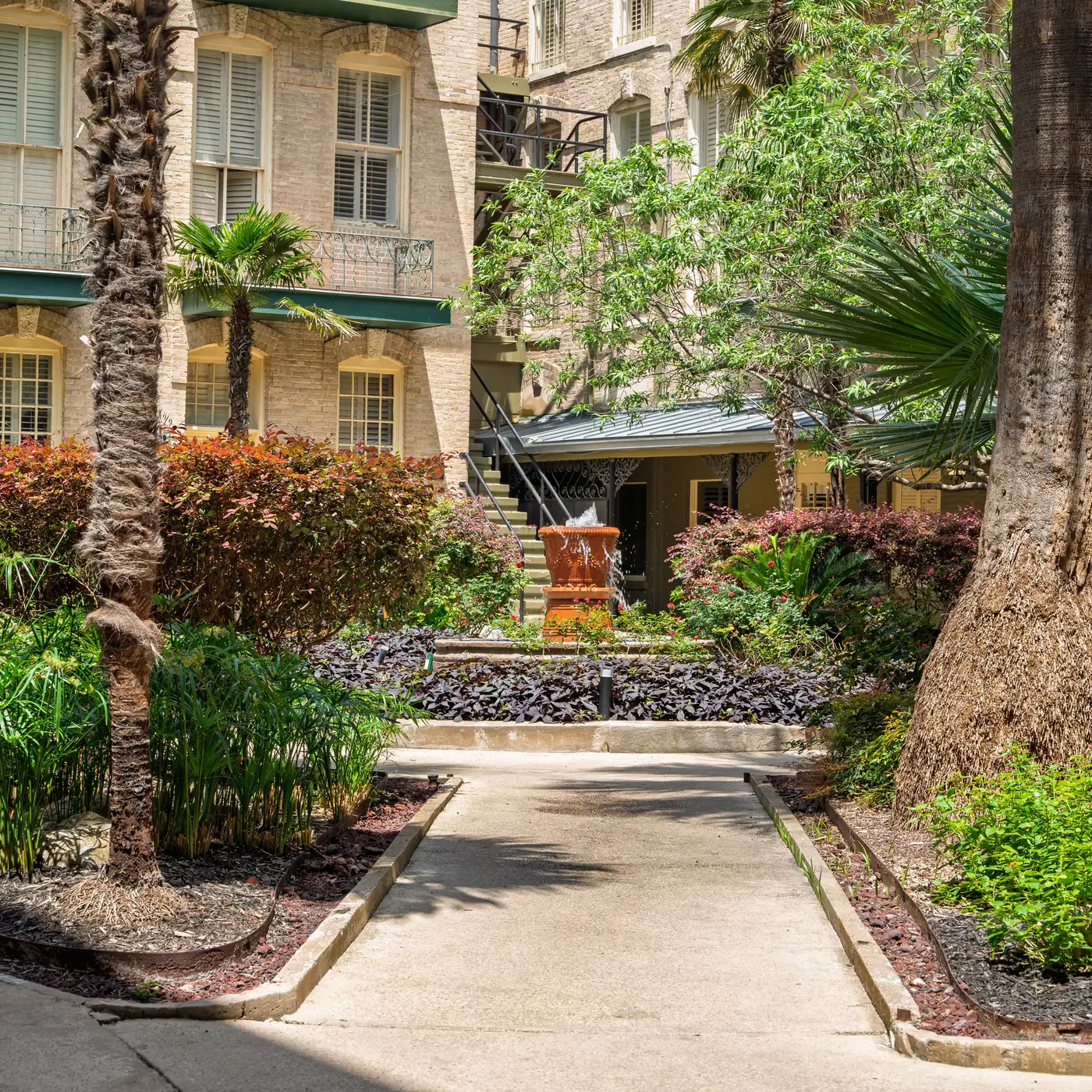A leafy historic courtyard in San Antonio, Texas
