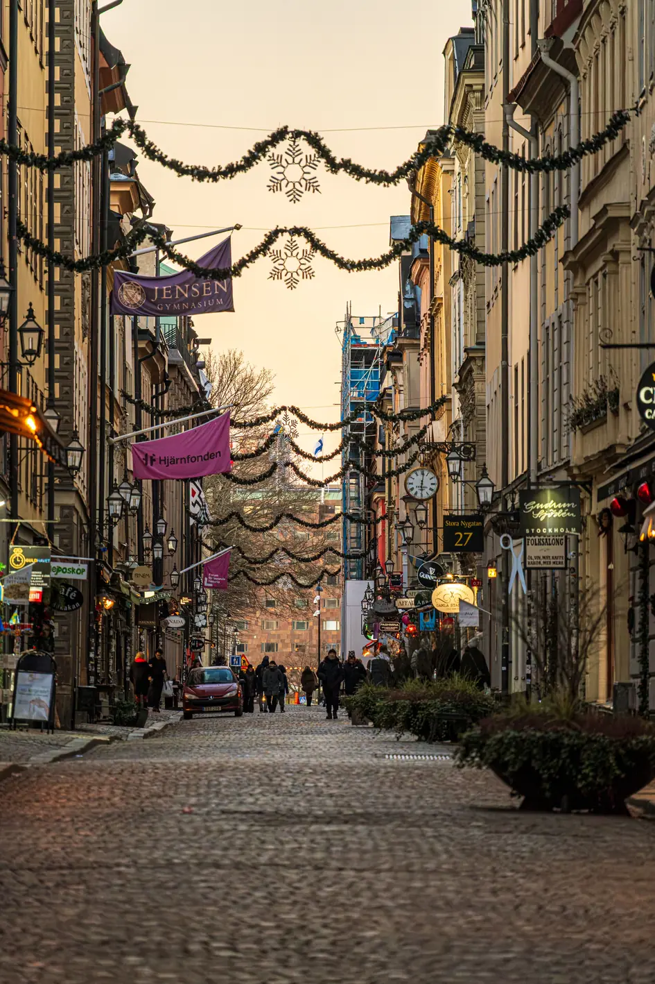 Christmas garlands strung over a street in Stockholm's old town