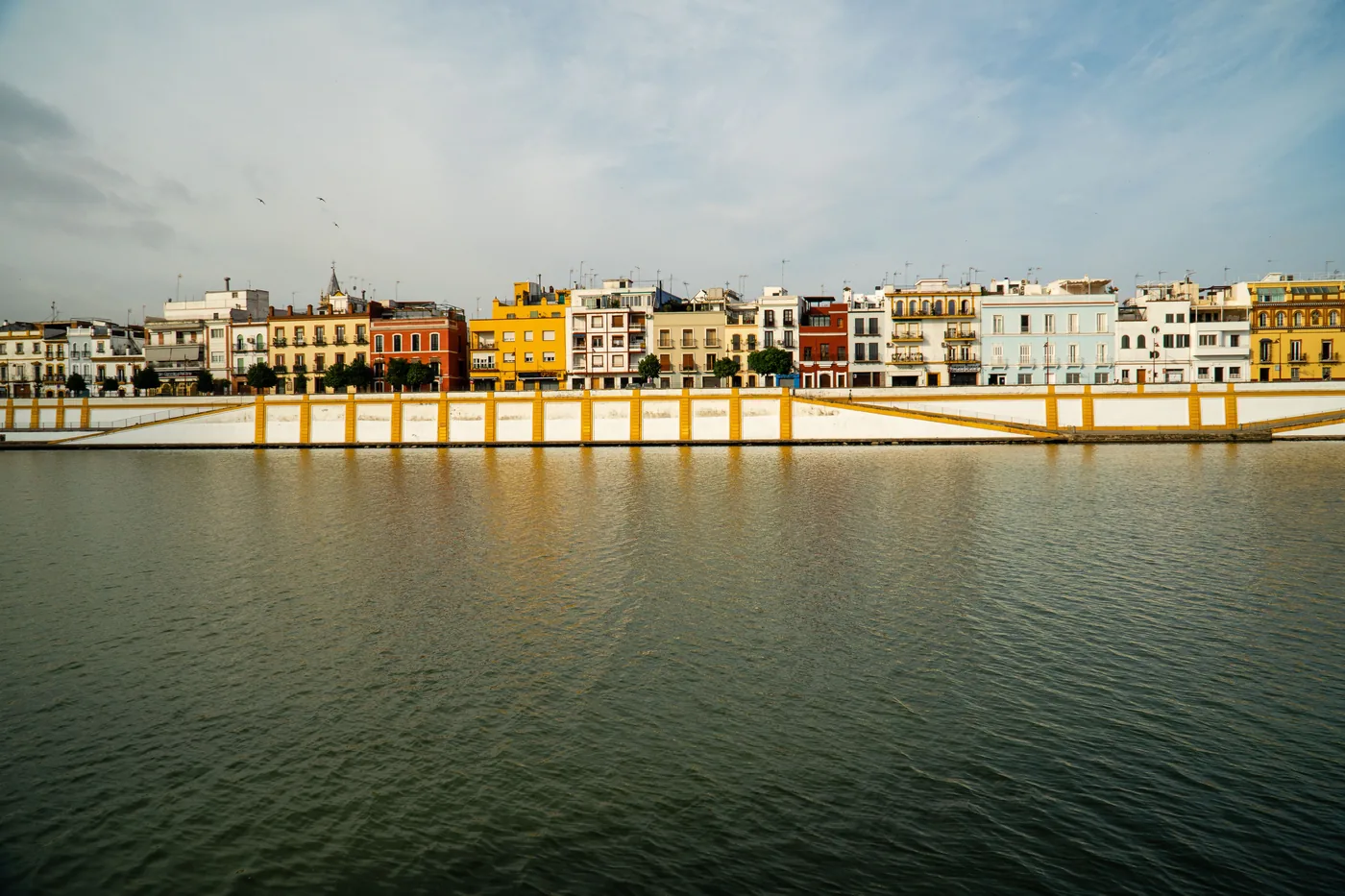 Colorful houses along the river in Triana, Seville