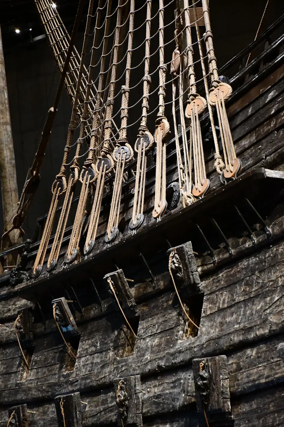 The carved wooden hull and rigging of the Vasa warship